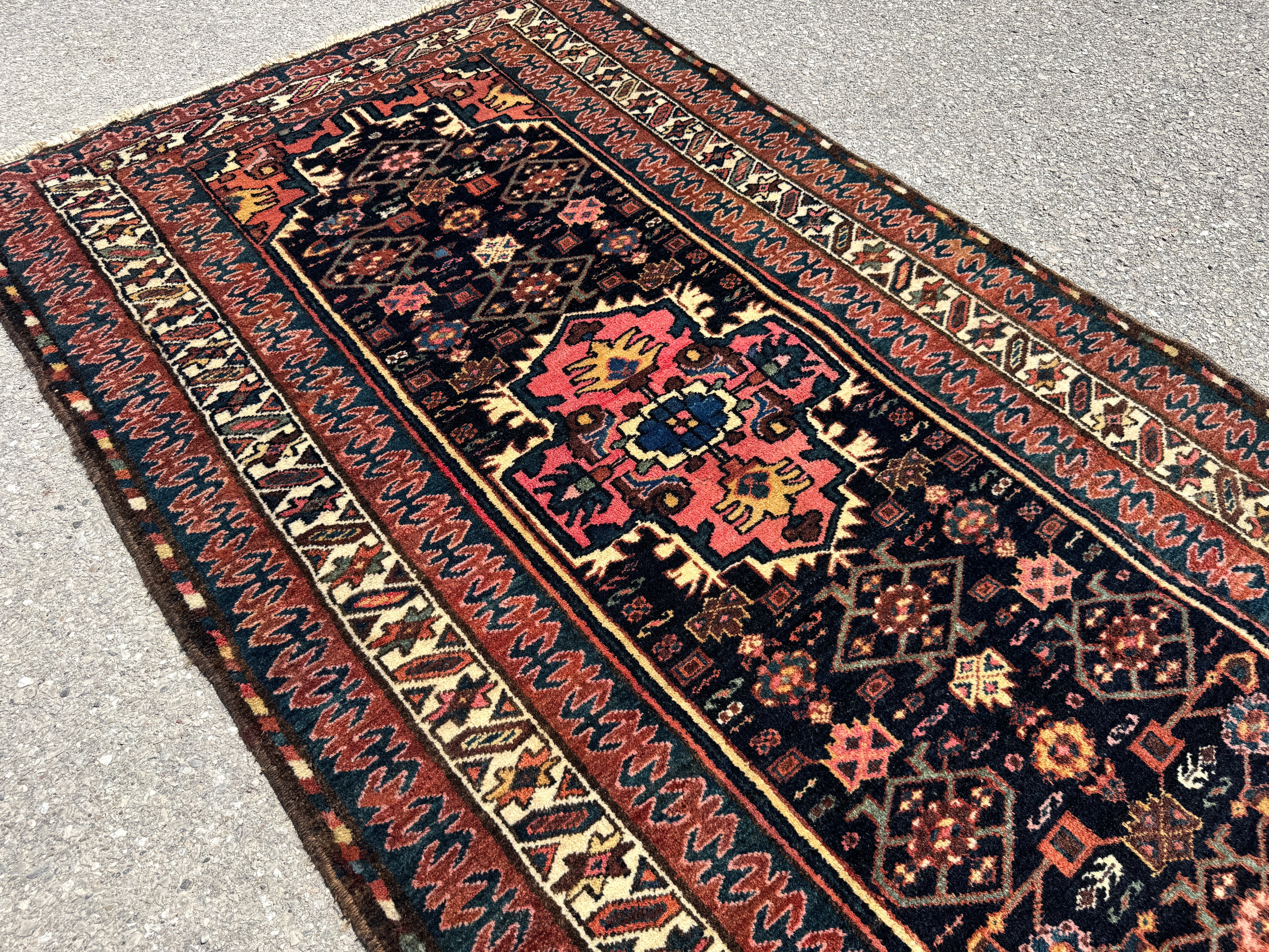 Vintage Kurdish Rug — Indigo & Coral Floral Medallion. Additional original photograph showing the rug's surface, design and weave. SKU 2050X.