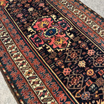 Vintage Kurdish Rug — Indigo & Coral Floral Medallion. Additional original photograph showing the rug's surface, design and weave. SKU 2050X.
