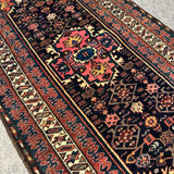 Vintage Kurdish Rug — Indigo & Coral Floral Medallion. Additional original photograph showing the rug's surface, design and weave. SKU 2050X.