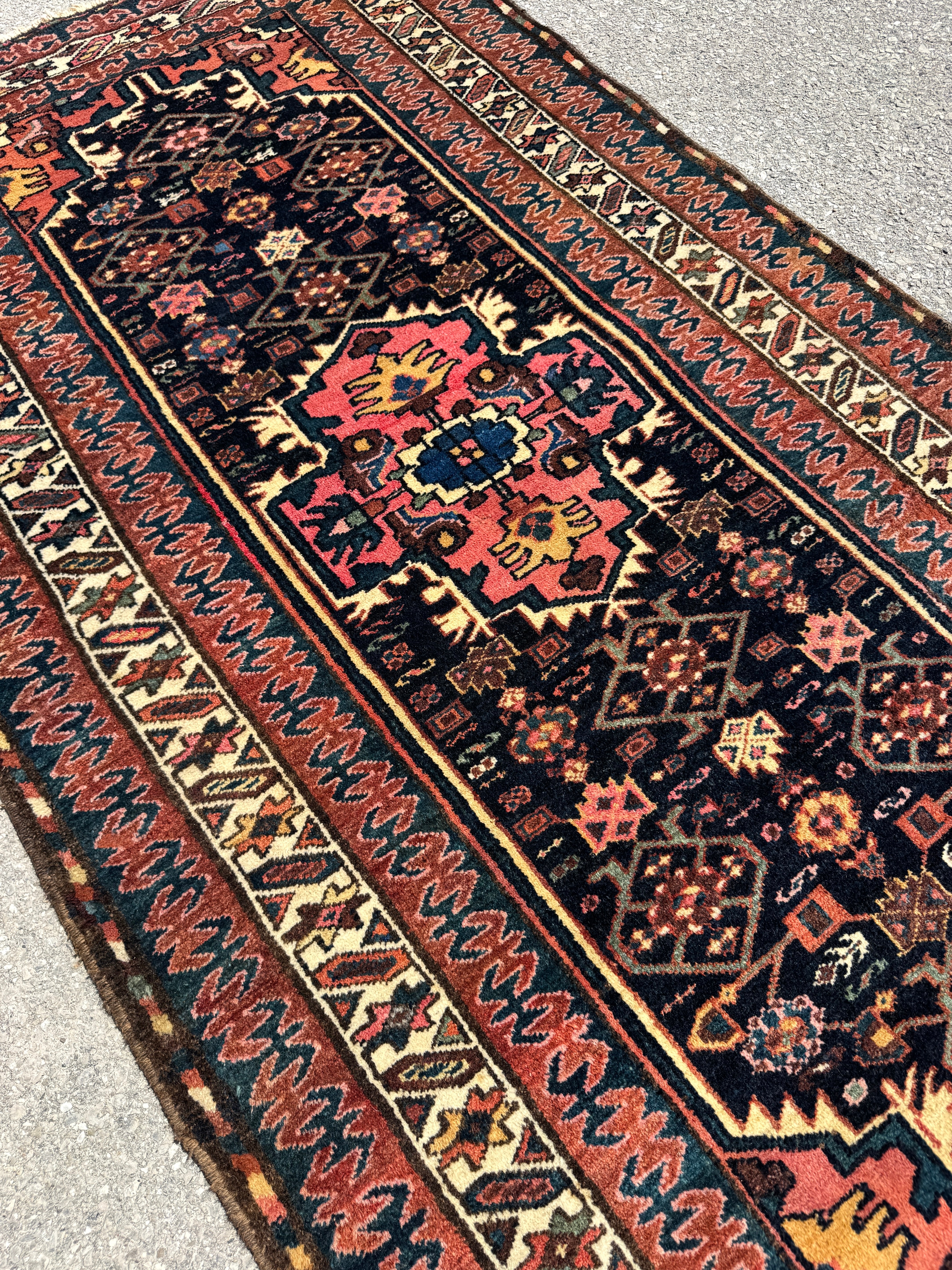 Vintage Kurdish Rug — Indigo & Coral Floral Medallion. Additional original photograph showing the rug's surface, design and weave. SKU 2050X.