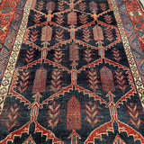 Antique Bakhtiari Rug — Cypress Lattice on Midnight Blue. Additional original photograph showing the rug's surface, design and weave. SKU 2058.