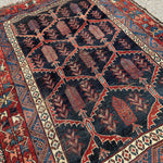 Antique Bakhtiari Rug — Cypress Lattice on Midnight Blue. Additional original photograph showing the rug's surface, design and weave. SKU 2058.