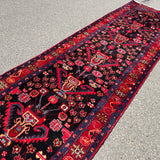 Vintage Nahavand Runner — Scarlet Florals on Midnight Blue. Additional original photograph showing the rug's surface, design and weave. SKU 2121.