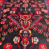 Vintage Nahavand Runner — Scarlet Florals on Midnight Blue. Additional original photograph showing the rug's surface, design and weave. SKU 2121.