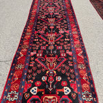 Vintage Nahavand Runner — Scarlet Florals on Midnight Blue. Additional original photograph showing the rug's surface, design and weave. SKU 2121.