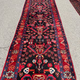 Vintage Nahavand Runner — Scarlet Florals on Midnight Blue. Additional original photograph showing the rug's surface, design and weave. SKU 2121.