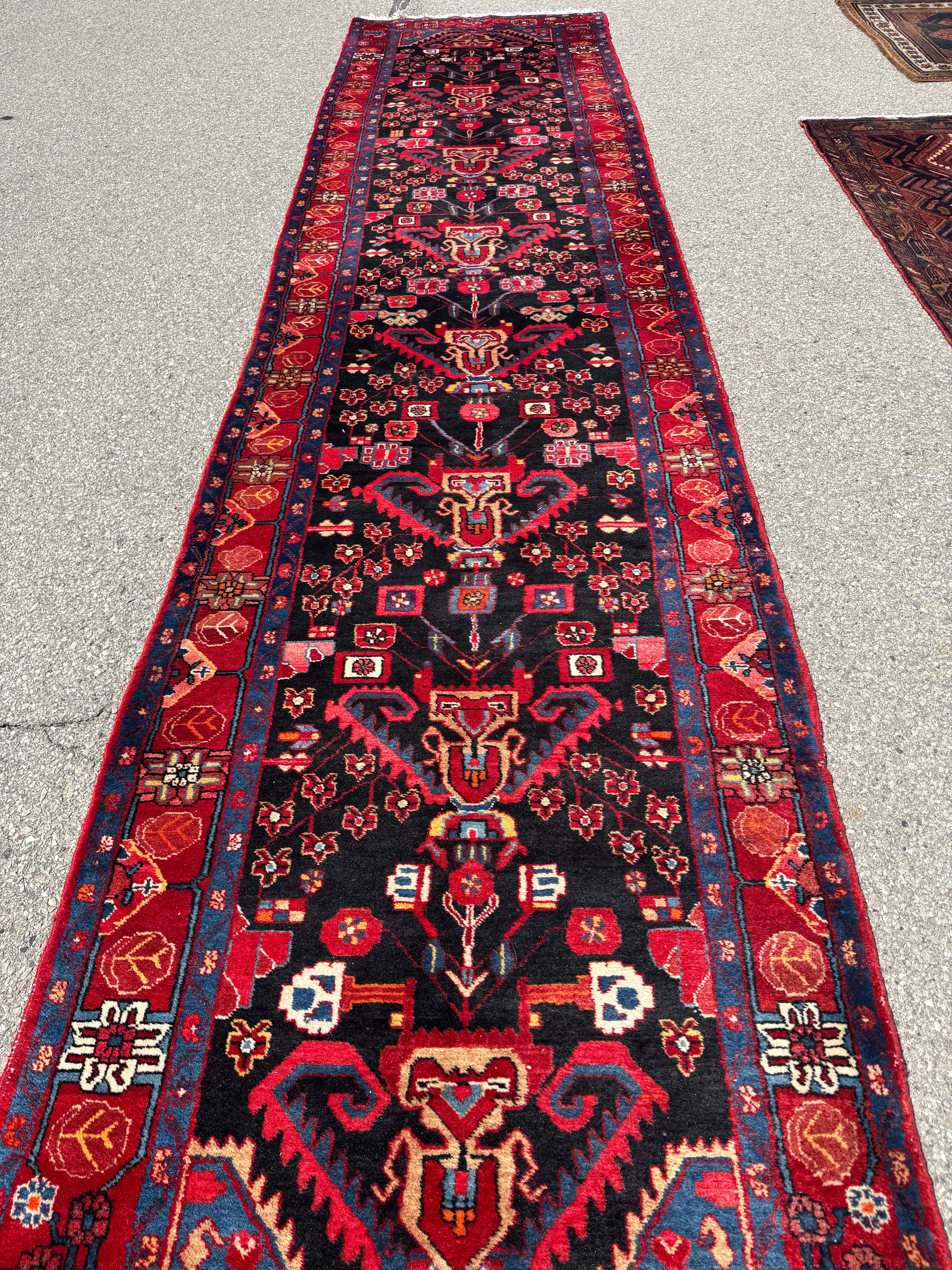 Vintage Nahavand Runner — Scarlet Florals on Midnight Blue. Additional original photograph showing the rug's surface, design and weave. SKU 2121.