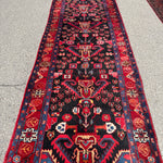 Vintage Nahavand Runner — Scarlet Florals on Midnight Blue. Additional original photograph showing the rug's surface, design and weave. SKU 2121.