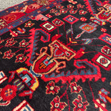 Vintage Nahavand Runner — Scarlet Florals on Midnight Blue. Additional original photograph showing the rug's surface, design and weave. SKU 2121.