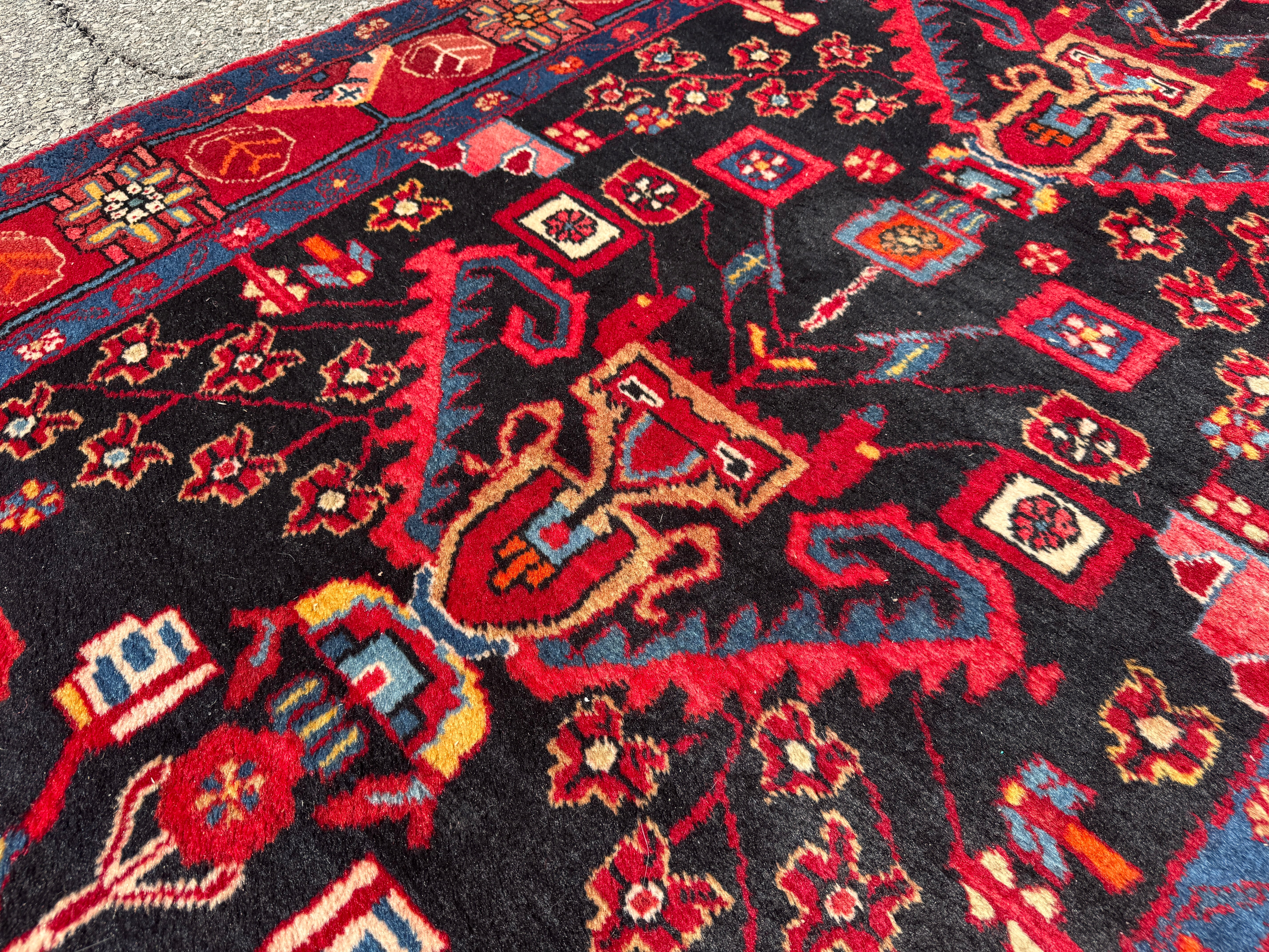 Vintage Nahavand Runner — Scarlet Florals on Midnight Blue. Additional original photograph showing the rug's surface, design and weave. SKU 2121.