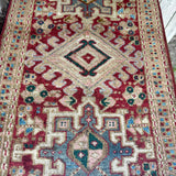 Vintage Karaja Runner — Soft Coral & Ivory Geometry. Additional original photograph showing the rug's surface, design and weave. SKU 52501010.