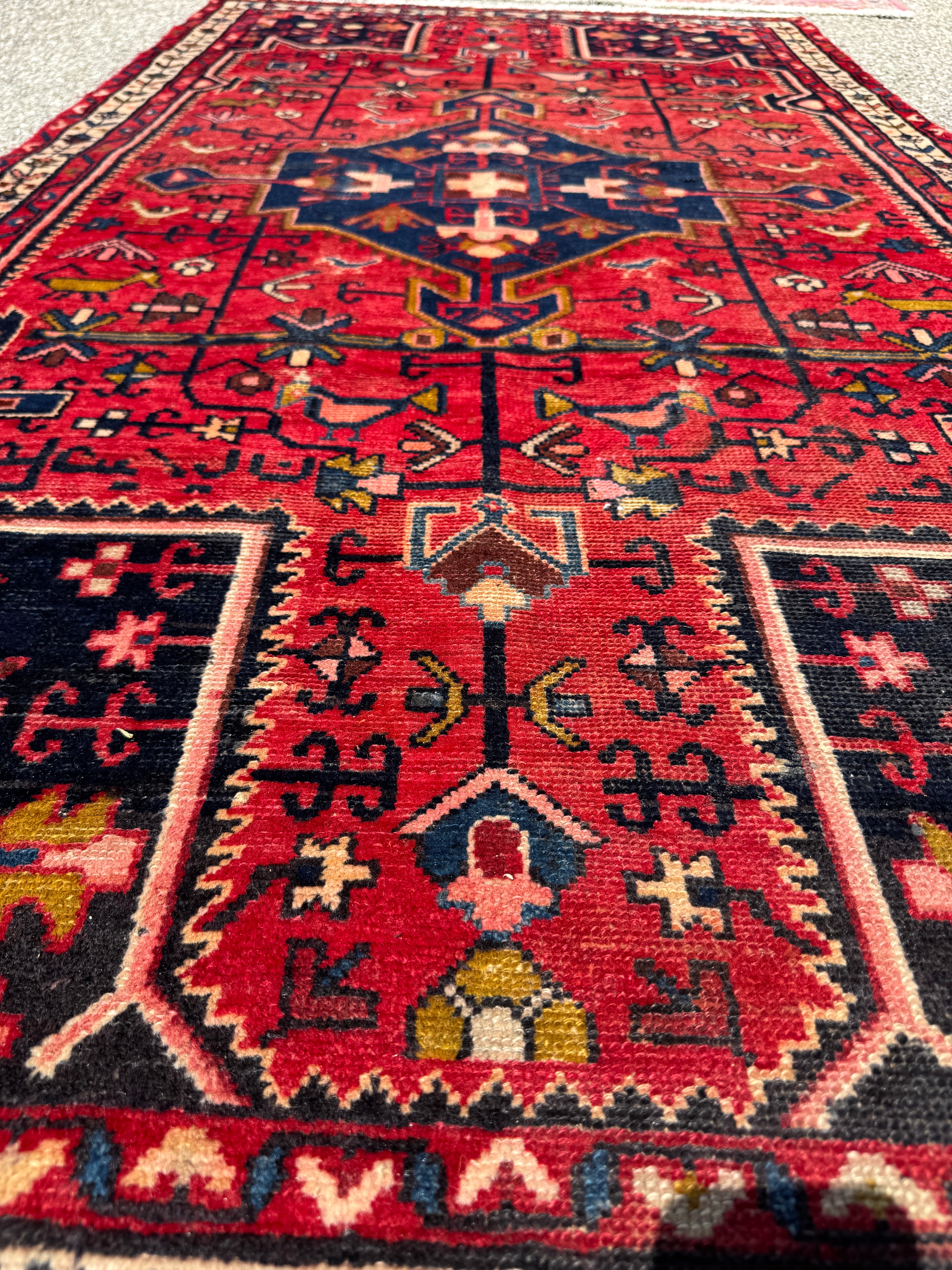 Vintage Tuyserkan Rug — Scarlet & Indigo Star Medallion. Additional original photograph showing the rug's surface, design and weave. SKU 52501024.