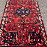 Vintage Tuyserkan Rug — Scarlet & Indigo Star Medallion. Additional original photograph showing the rug's surface, design and weave. SKU 52501024.