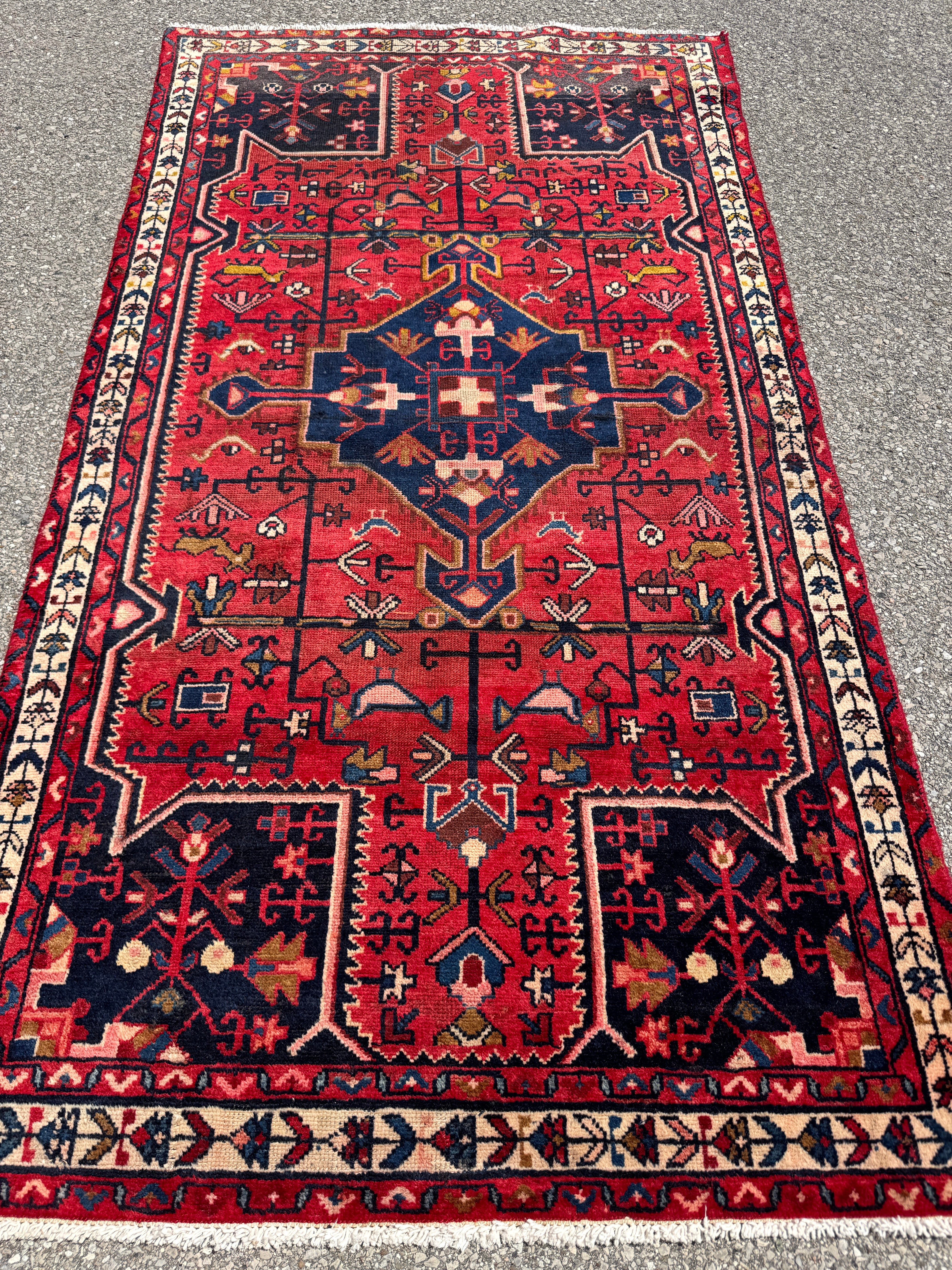Vintage Tuyserkan Rug — Scarlet & Indigo Star Medallion. Additional original photograph showing the rug's surface, design and weave. SKU 52501024.