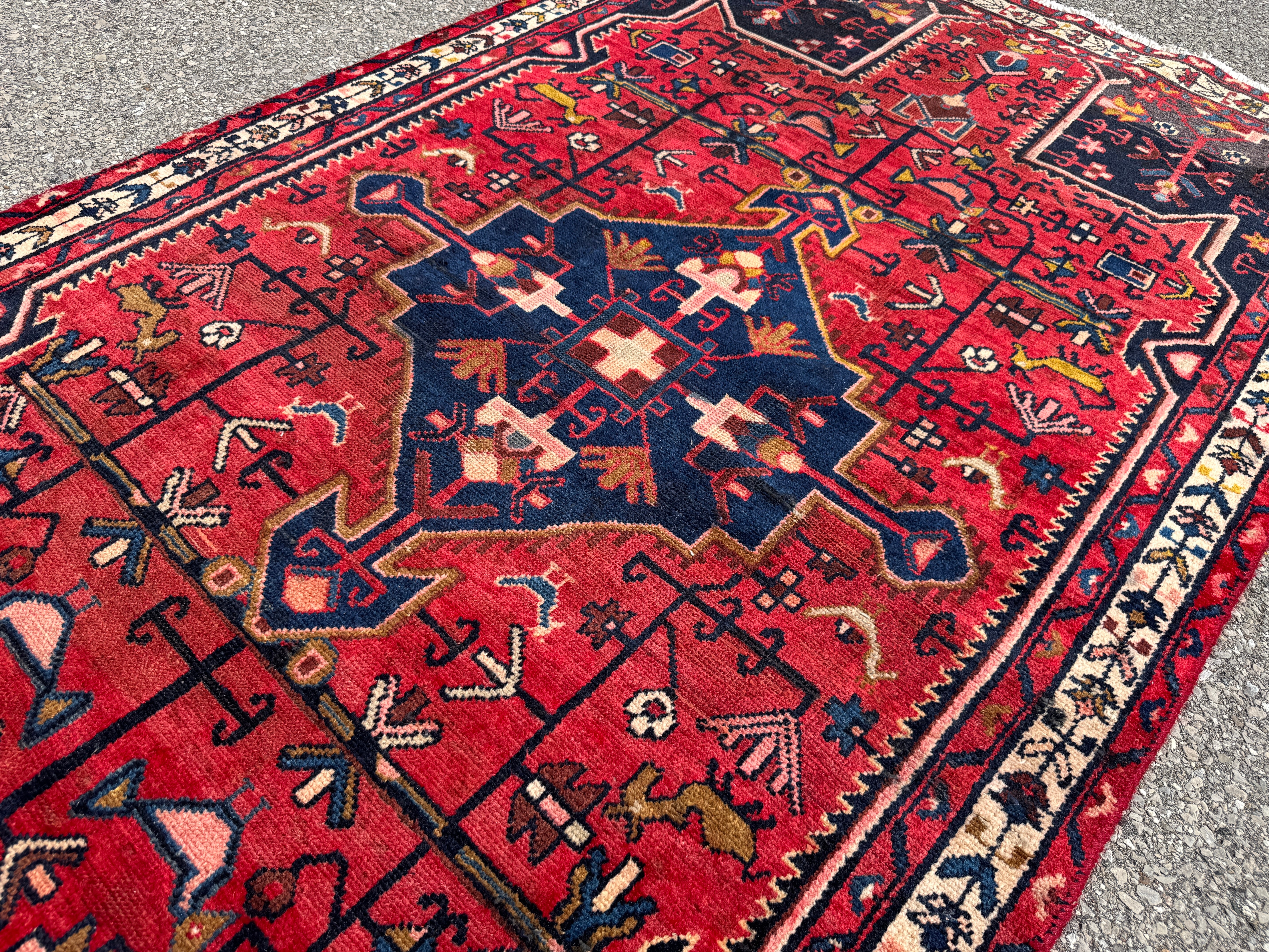 Vintage Tuyserkan Rug — Scarlet & Indigo Star Medallion. Additional original photograph showing the rug's surface, design and weave. SKU 52501024.