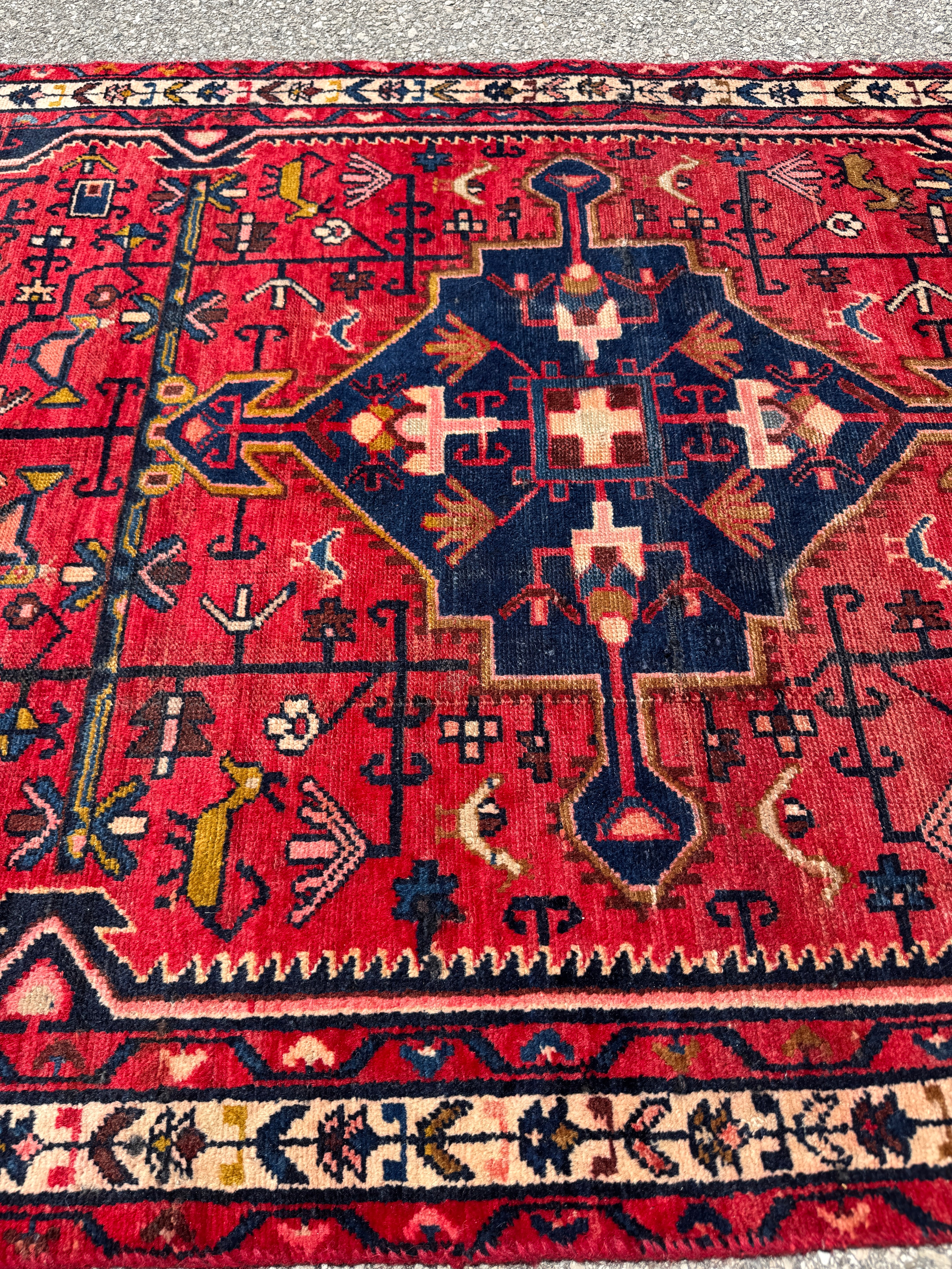 Vintage Tuyserkan Rug — Scarlet & Indigo Star Medallion. Additional original photograph showing the rug's surface, design and weave. SKU 52501024.