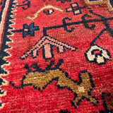 Vintage Tuyserkan Rug — Scarlet & Indigo Star Medallion. Additional original photograph showing the rug's surface, design and weave. SKU 52501024.