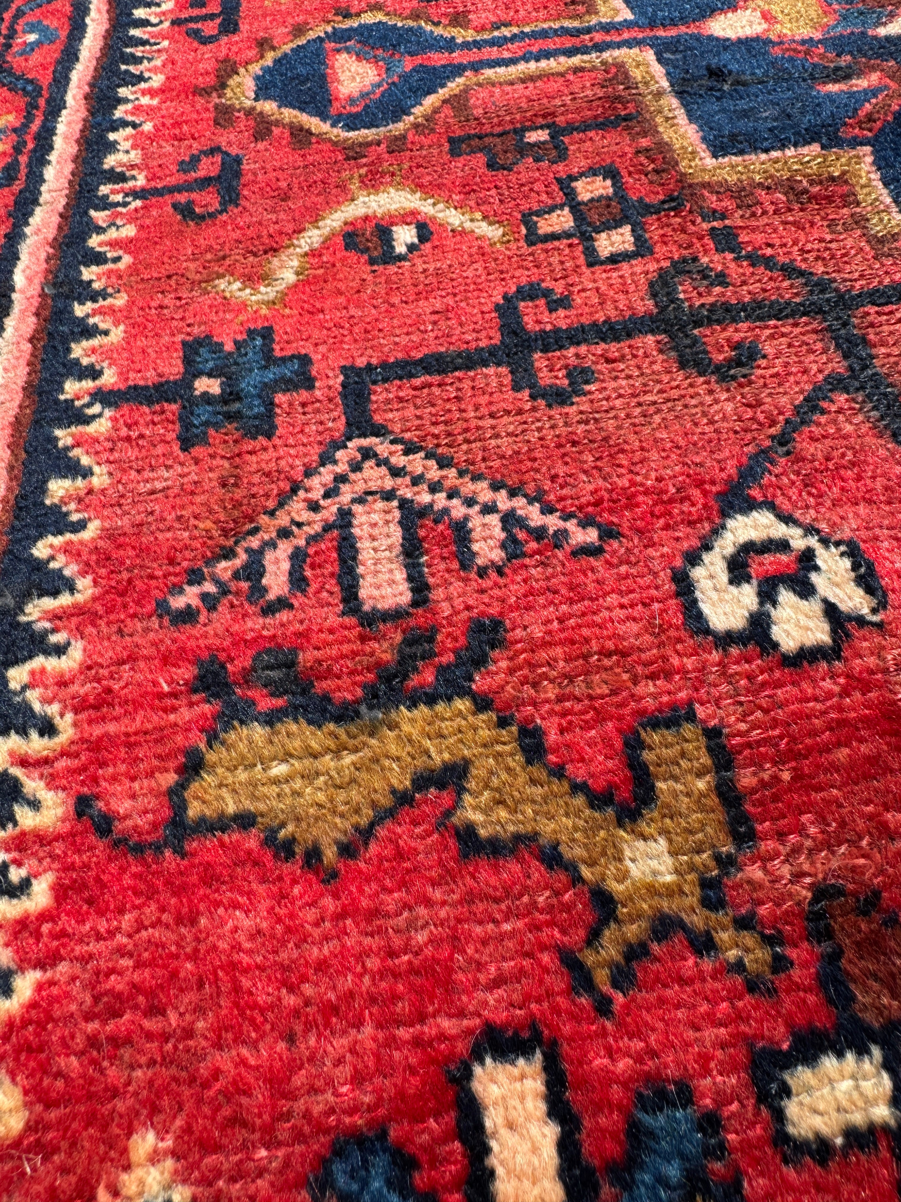Vintage Tuyserkan Rug — Scarlet & Indigo Star Medallion. Additional original photograph showing the rug's surface, design and weave. SKU 52501024.
