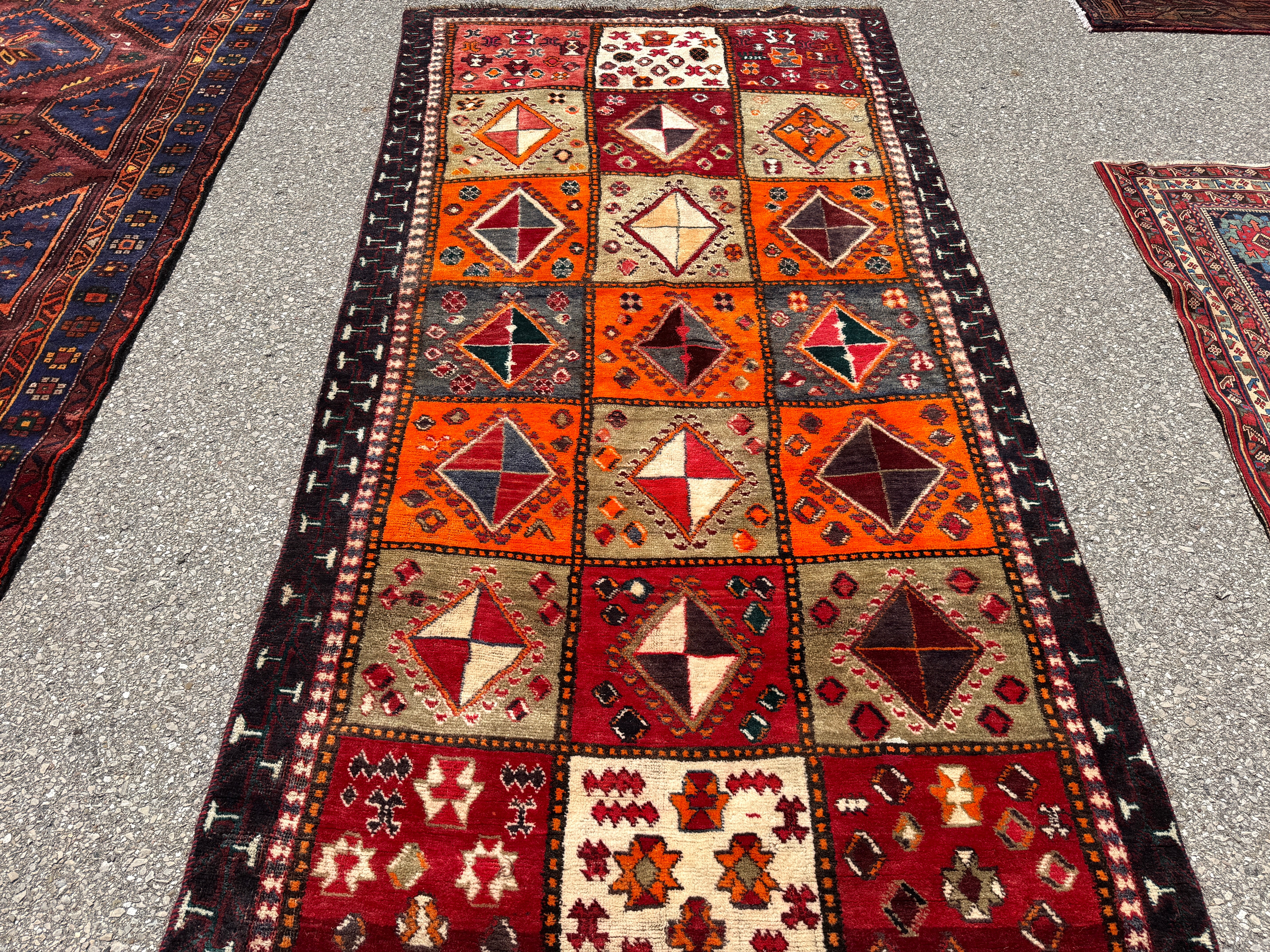 Vintage Shiraz Rug — Scarlet & Ivory Geometric Panels. Additional original photograph showing the rug's surface, design and weave. SKU 52501027.
