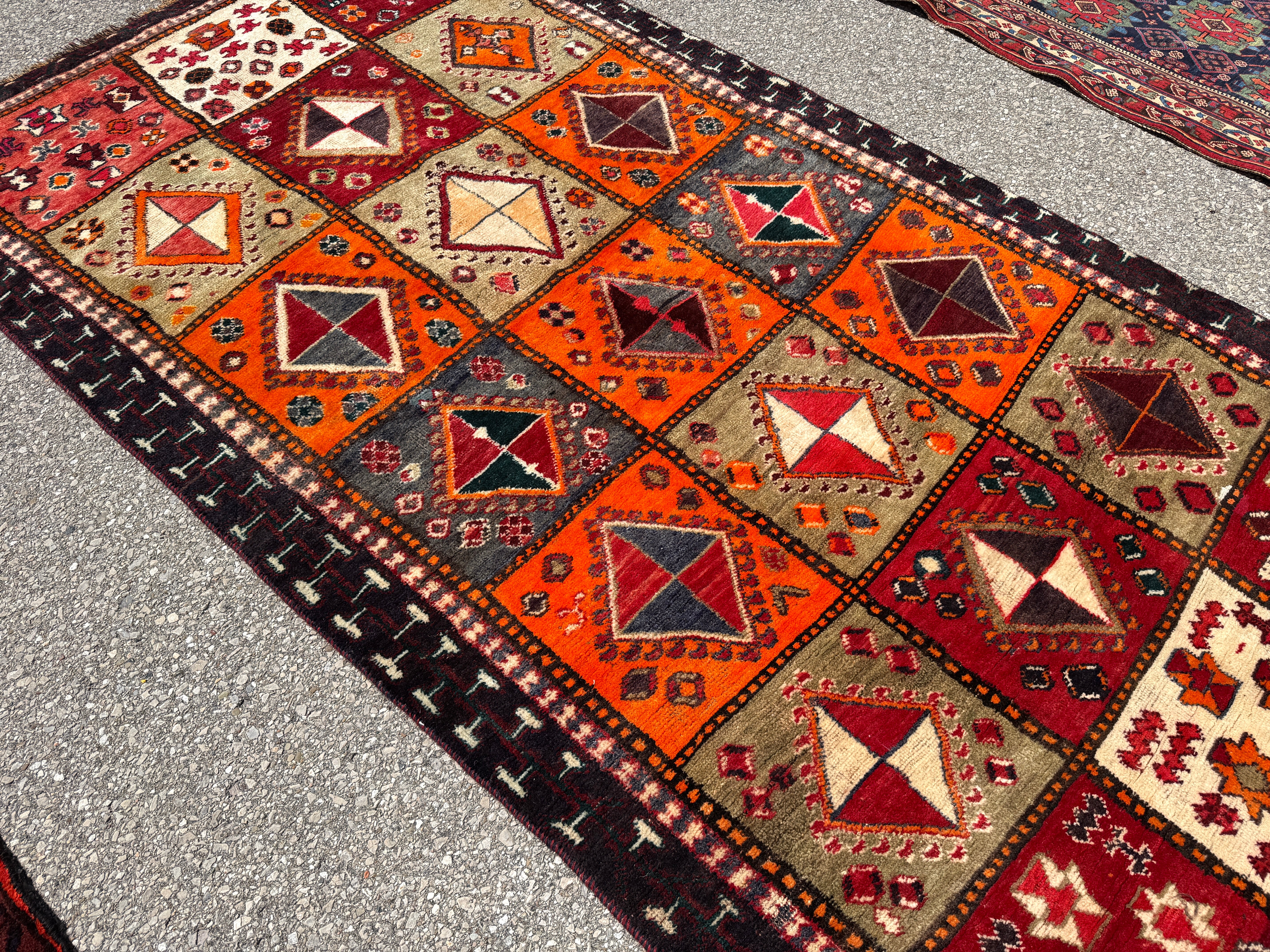 Vintage Shiraz Rug — Scarlet & Ivory Geometric Panels. Additional original photograph showing the rug's surface, design and weave. SKU 52501027.