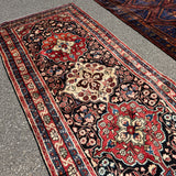 Mahal Runner — Ivory & Terracotta on Midnight Blue. Additional original photograph showing the rug's surface, design and weave. SKU 52510131.