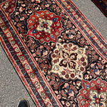Mahal Runner — Ivory & Terracotta on Midnight Blue. Additional original photograph showing the rug's surface, design and weave. SKU 52510131.