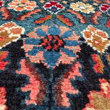 Hamadan Runner — Jewel-Tone Floral Rows on Indigo. Additional original photograph showing the rug's surface, design and weave. SKU 52510133.