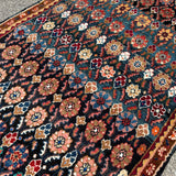 Hamadan Runner — Jewel-Tone Floral Rows on Indigo. Additional original photograph showing the rug's surface, design and weave. SKU 52510133.