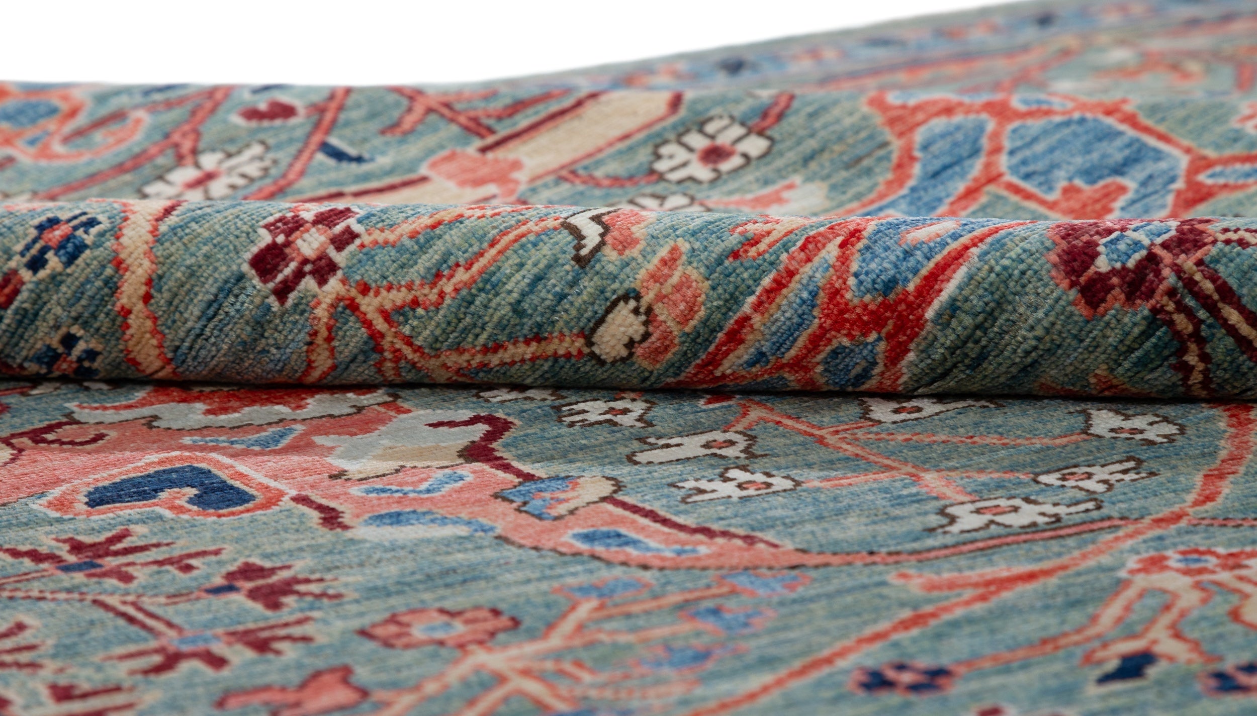 Afghan Chobbi Rug in muted green, rust and navy — pattern, texture or angled view