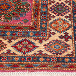 Afghan Super Kazak Rug in rose, navy and gold — pattern, texture or angled view
