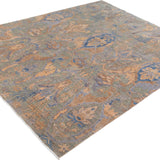 Chobbi Rug in muted blue and gold — pattern, texture or angled view