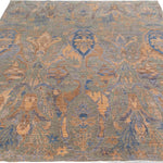 Chobbi Rug in muted blue and gold — pattern, texture or angled view