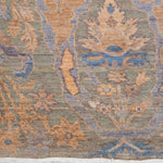 Chobbi Rug in muted blue and gold — pattern, texture or angled view