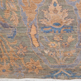 Chobbi Rug in muted blue and gold — pattern, texture or angled view