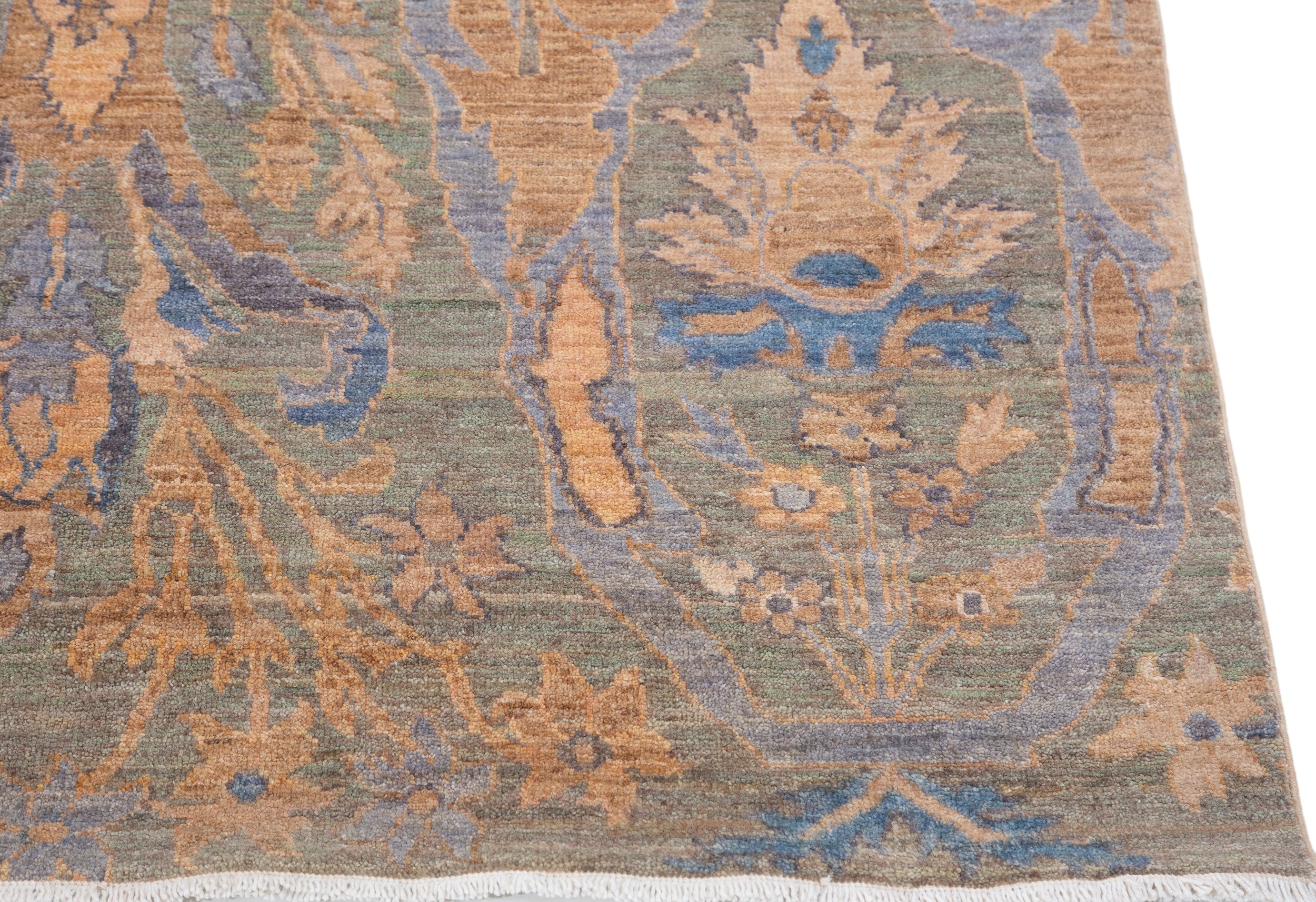 Chobbi Rug in muted blue and gold — pattern, texture or angled view