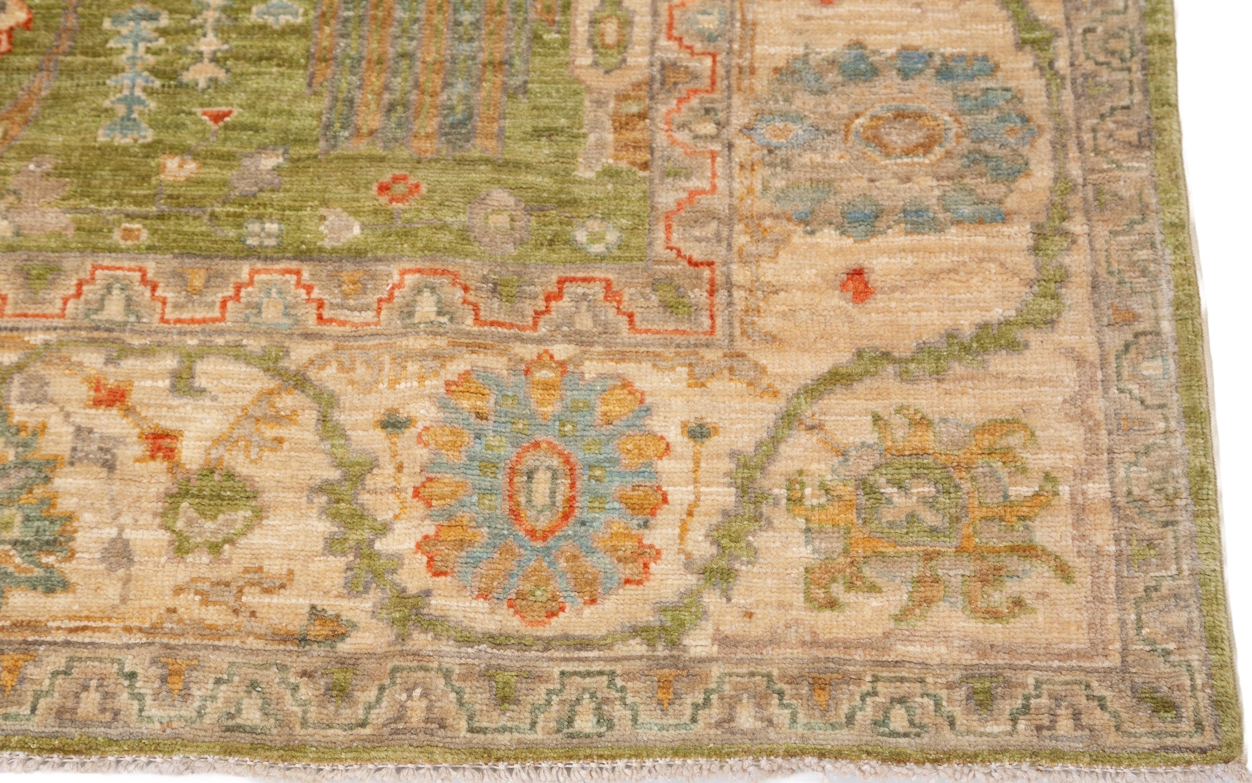 Chobbi Rug in olive green and cream — pattern, texture or angled view