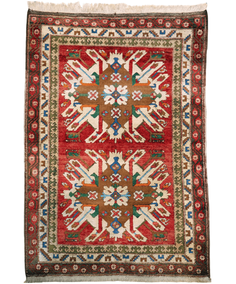 Turkish Kars rug full view with maroon center medallion, cream border, and geometric star and flower motifs.