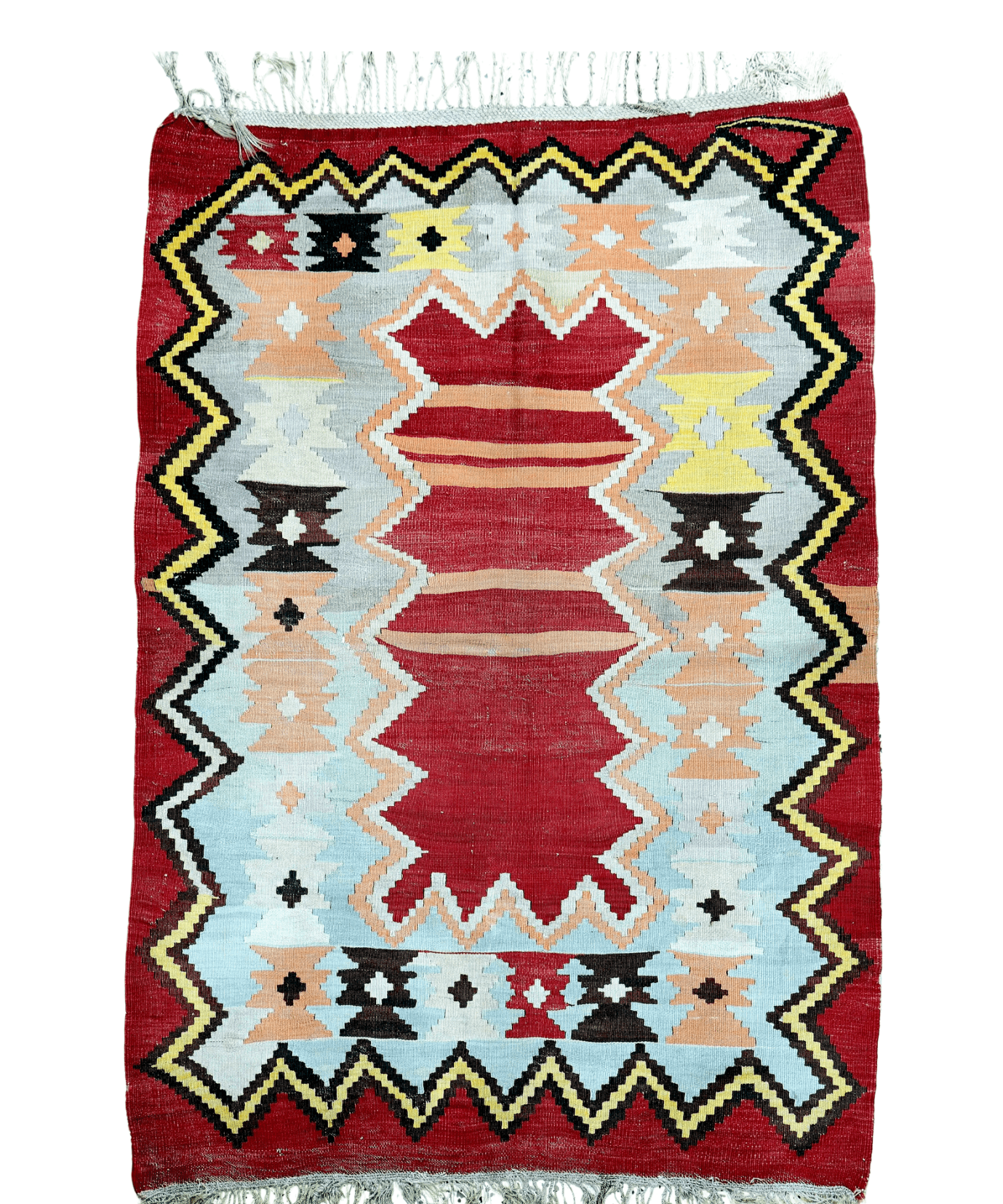 Turkish kilim rug with red background, geometric diamonds, and zigzag border