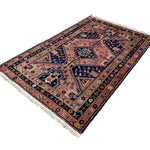Vintage Afshar Luri Rug, diagonal perspective view of the complete rug, hand-knotted wool pile. SKU RR 32536.