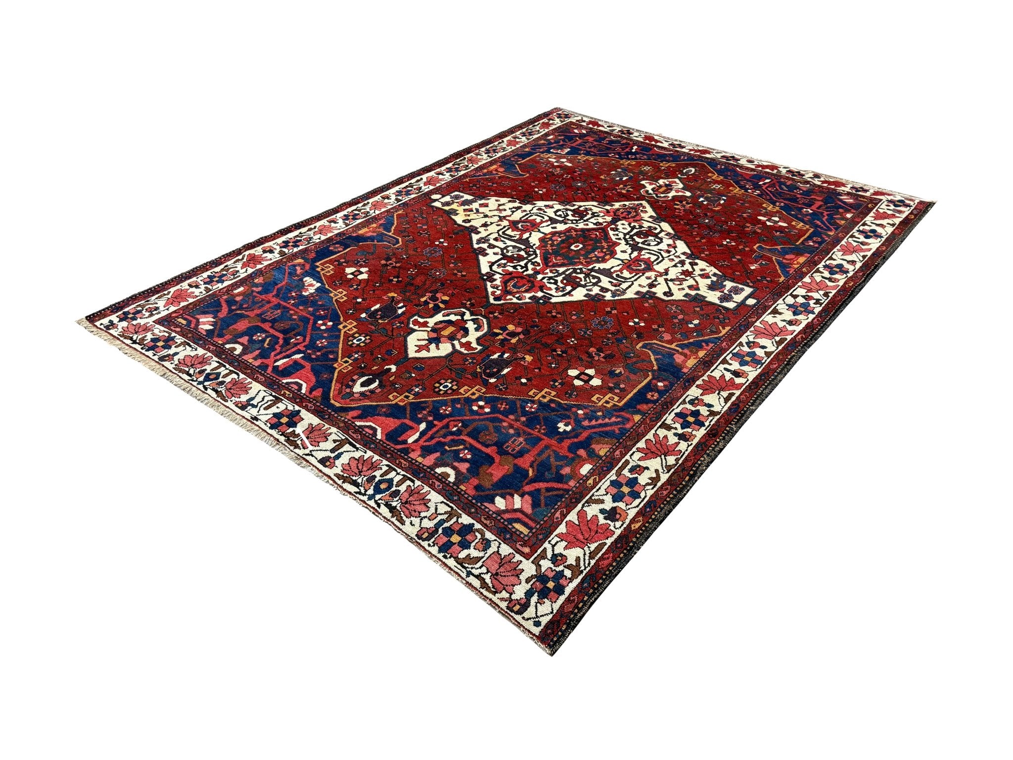 Vintage Chaleshtor Bakhtiari Rug, diagonal perspective view of the complete rug, hand-knotted wool pile. SKU 108870.