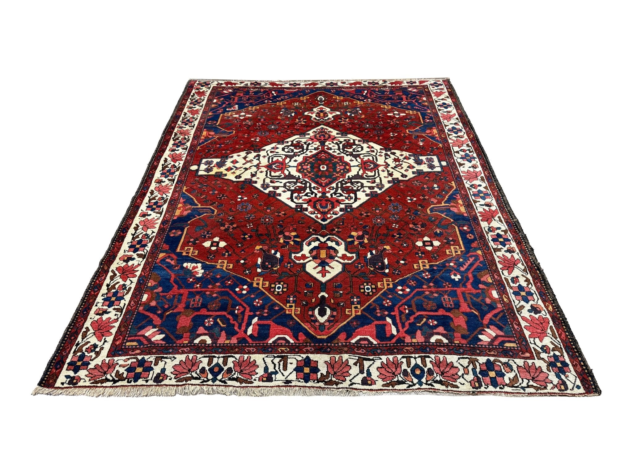 Vintage Chaleshtor Bakhtiari Rug, front perspective view of the complete rug, hand-knotted wool pile. SKU 108870.