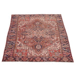 Vintage Heriz Rug | 7' 4" x 10' 4" — angled view, gallery 02