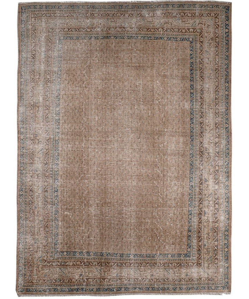 Square vintage area rug with beige center, blue border detailing, and clean fringe