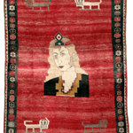 Vintage Persian Gabbeh rug with red field, cream face, dark clothing, and border motifs.