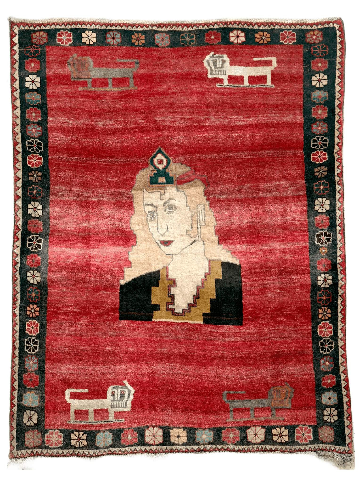Vintage Persian Gabbeh rug with red field, cream face, dark clothing, and border motifs.