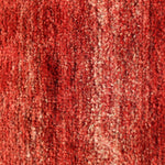 Red Persian Gabbeh rug surface texture in dense looped pile with subtle mottling.