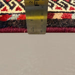 Vintage Quchan Kurdish Rug, side-on pile and edge detail with a ruler, hand-knotted wool pile. SKU RR32561.