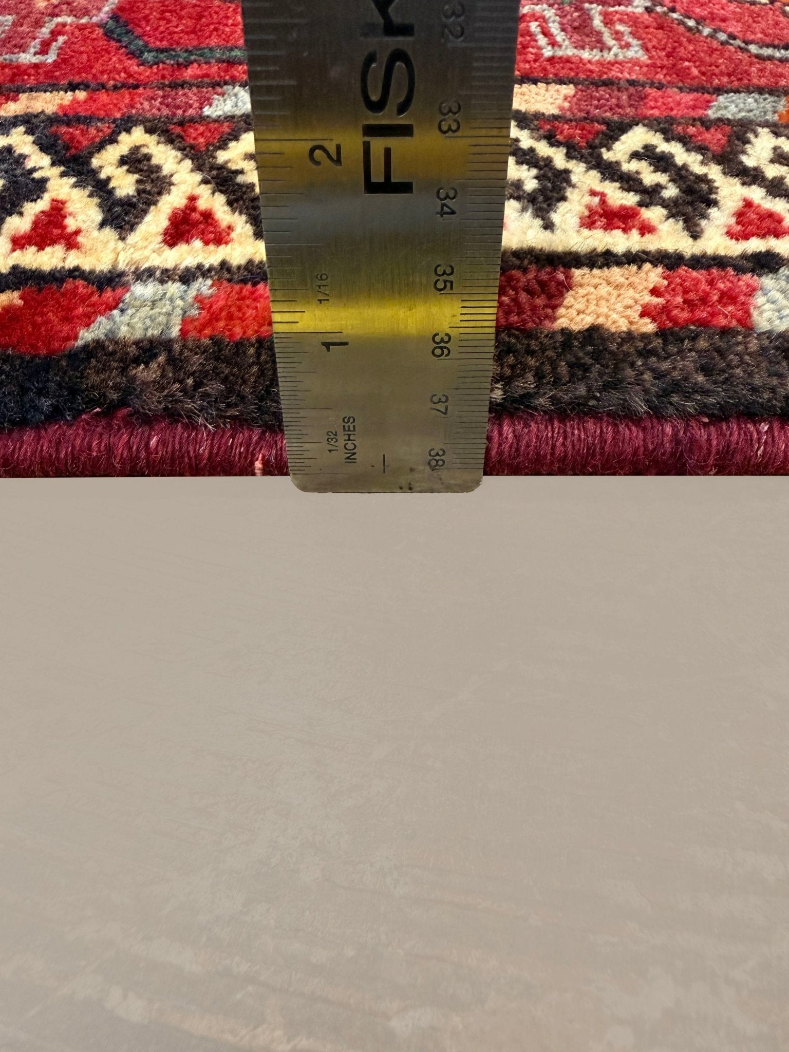Vintage Quchan Kurdish Rug, side-on pile and edge detail with a ruler, hand-knotted wool pile. SKU RR32561.