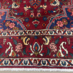 Vintage Saman Bakhtiari Rug, close-up of the central medallion, hand-knotted wool pile. SKU EE 1.1233.