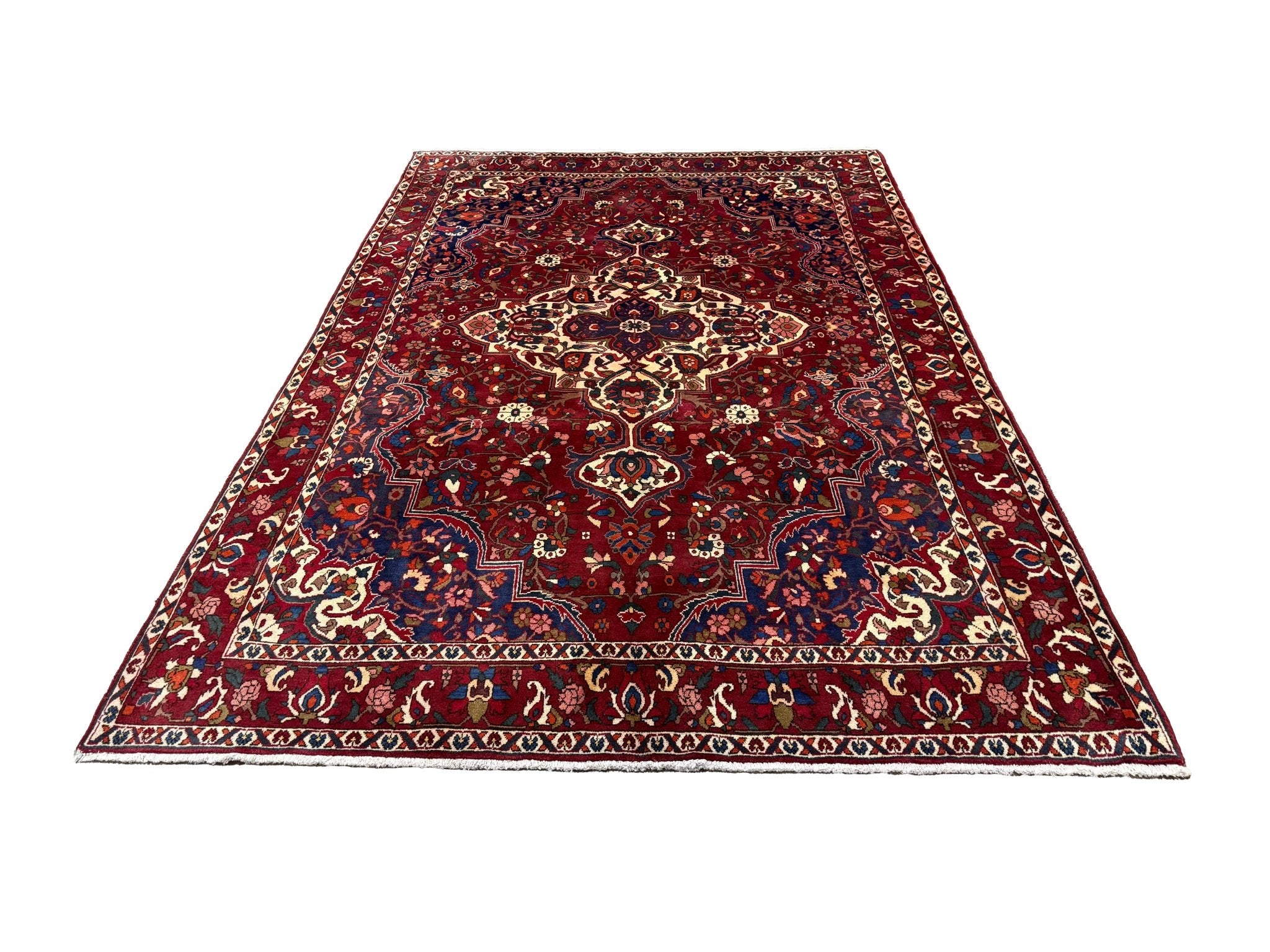 Vintage Saman Bakhtiari Rug, front perspective view of the complete rug, hand-knotted wool pile. SKU EE 1.1233.